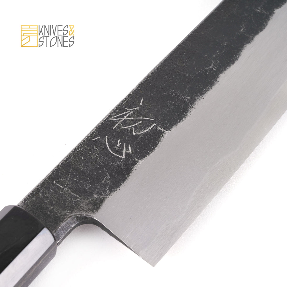 http://knivesandstones.us/cdn/shop/products/MyojinBlue2KurouchiSingle-BevelK-TipGyutoc_1200x1200.jpg?v=1653614022